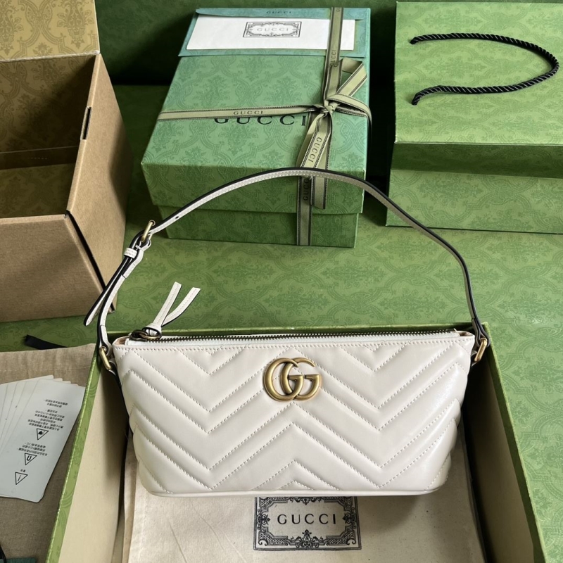 G*u*i top handle bags